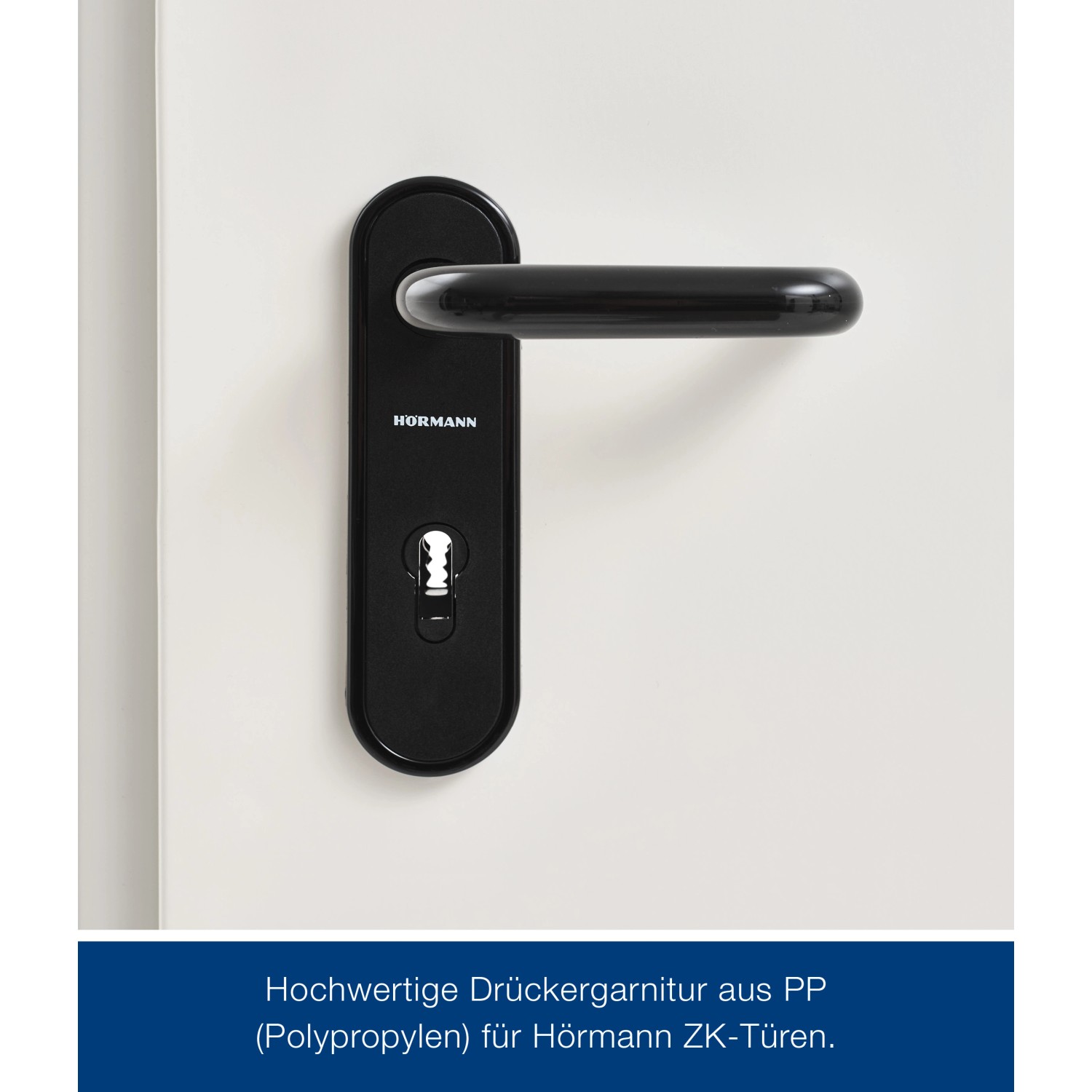 Schwarze Drückergarnitur für ZK-Tür-Element, Detailansicht.