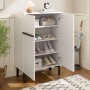 Weißer okwish Schuhschrank mit Doppeltüren, offen, zeigt Stauraum für Schuhe. Schwarze Beine, moderner Eingangsbereich.
