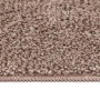 Brauner Shaggy Hochflorteppich aus PP mit rutschfester Unterseite. Weiche, flauschige Textur und sauberer Rand.