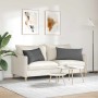 Zwei dunkelgraue Sofakissen 80x40 cm aus Stoff auf beigem Sofa.