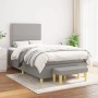 Hellgraues Boxspringbett 120x200 cm mit Matratze und Bank. Stoffbezug, modernes Design für Schlafzimmer.
