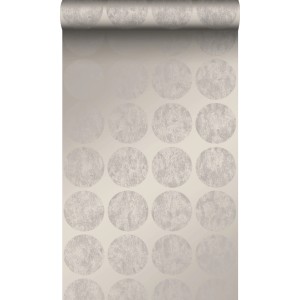 Vliestapete mit großen, verwitterten Kugeln in Taupe. Modernes Design mit metallischem Glanz für Industrial Chic.