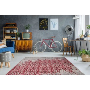 Vintage Teppich rot mit orientalischem Muster, 160x230 cm. Gemusterter Teppich im Wohnraum.
