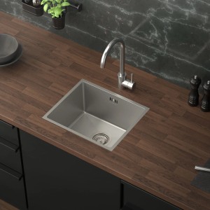 ML-Design Edelstahl Spülbecken, 34x40 cm, mit Siphon auf dunkler Arbeitsplatte.