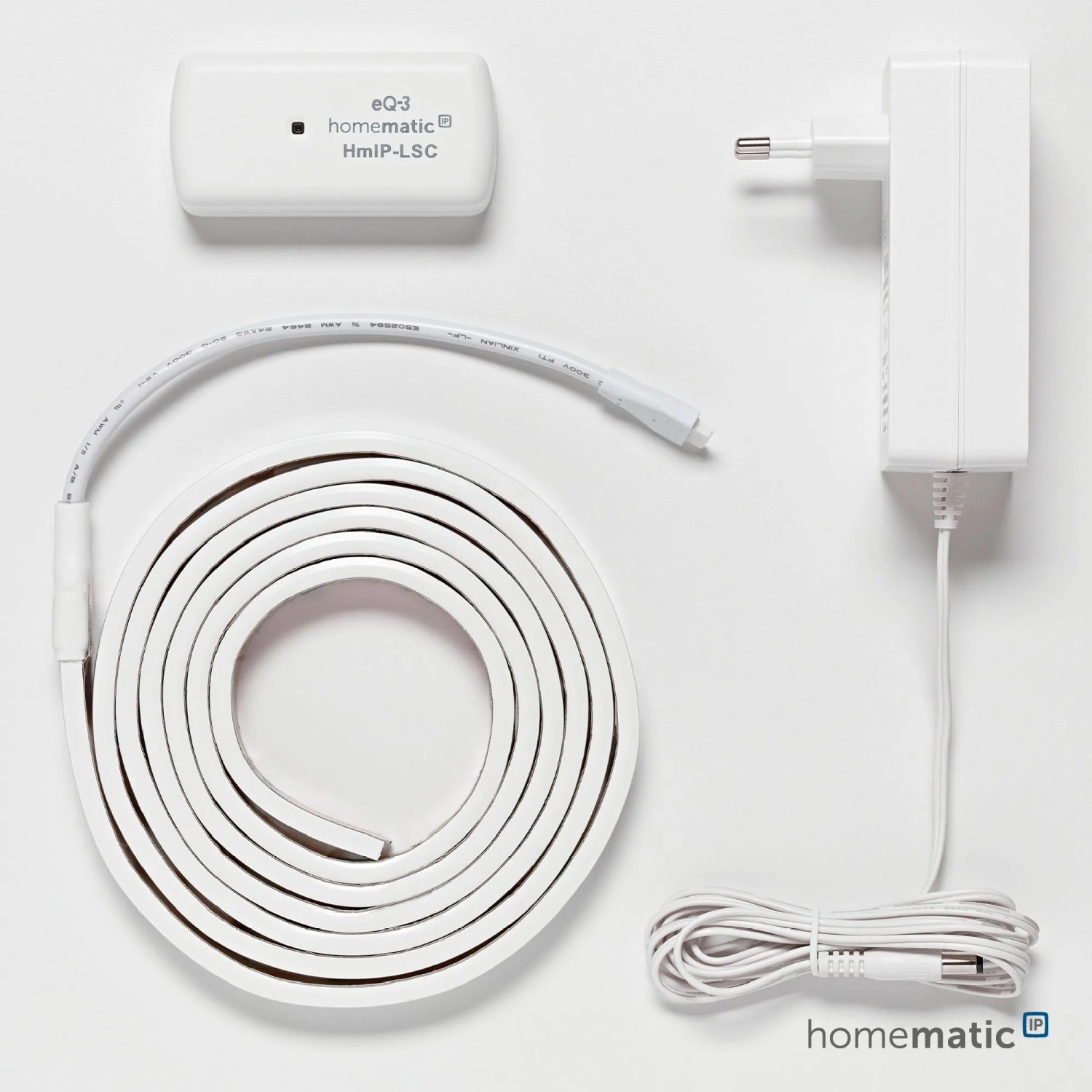 Homematic IP Lightstrip Set (2 m) für Hausautomation: LED-Streifen, Controller und Netzteil.