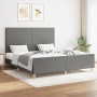 Dunkelgraues Stoff-Bettgestell mit Kopfteil (160x200 cm) im Schlafzimmer.