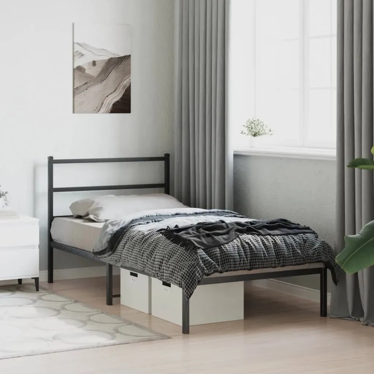 Schwarzes Metall Bettgestell 107x203 cm mit Kopfteil und Stauraum unter dem Bett.