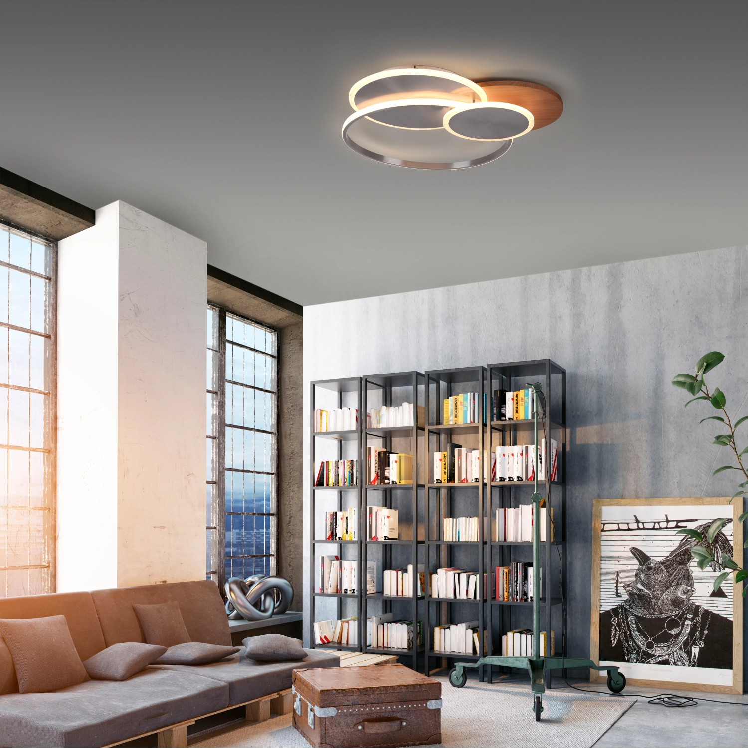Moderne LED-Deckenleuchte Palma von Paul Neuhaus mit Holzdekor und silberfarbenen Ringen im Wohnzimmer.