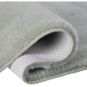 Nahaufnahme: Lalee Badteppich Paradise in Jade, flauschiger Flor, rutschfeste Unterseite.