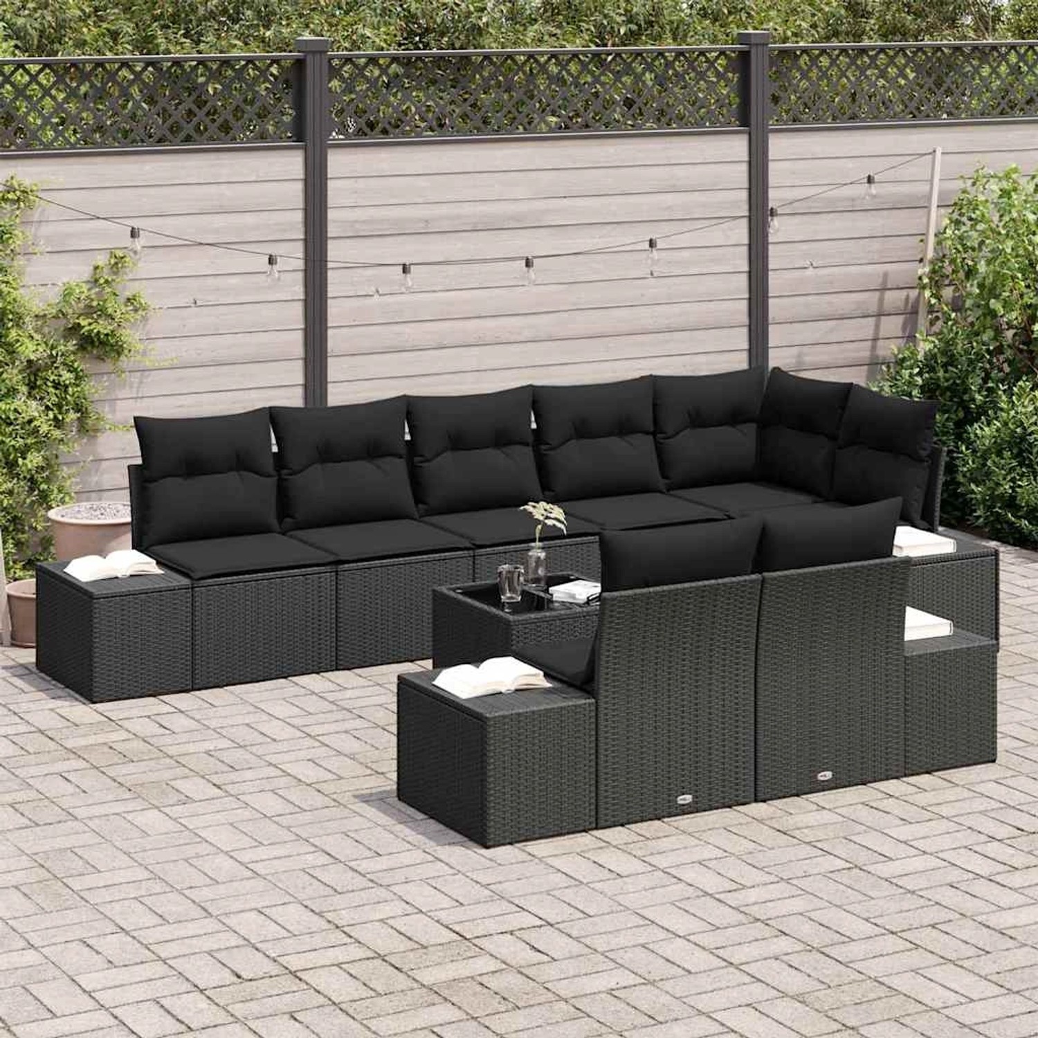 Schwarzes 9-teiliges vidaXL Garten-Sofa-Set aus Poly Rattan mit Kissen für den Garten.