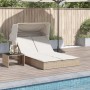 Beige Doppel-Sonnenliege mit Dach und Auflagen aus Poly Rattan. Entspannung pur im Garten.