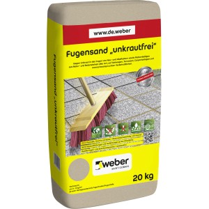 Sack Weber Fugensand unkrautfrei 20kg, hellgrau, mit Besen auf Pflastersteinen. Unkrauthemmend für Pflasterfugen.