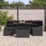 Schwarzes 7-teiliges vidaXL Garten-Sofa-Set aus Poly Rattan mit Tisch und Kissen.