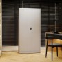 Weißer JAN NOWAK TOMASZ Aktenschrank aus Metall mit zwei Türen und Schloss in einem modernen Büro.
