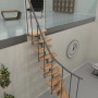 Minka Raumspartreppe Monte Carlo, grau mit hellen Buchenholzstufen, elegantes Design für Innentreppen.