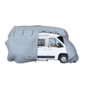 Graue GreenYard® Wohnmobil Schutzhülle XL (870x235x275 cm) über einem weißen Wohnmobil.