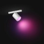 Weißer Philips Hue Perifo LED-Spot zur Schienensystem-Erweiterung mit farbigem Lichtschein.