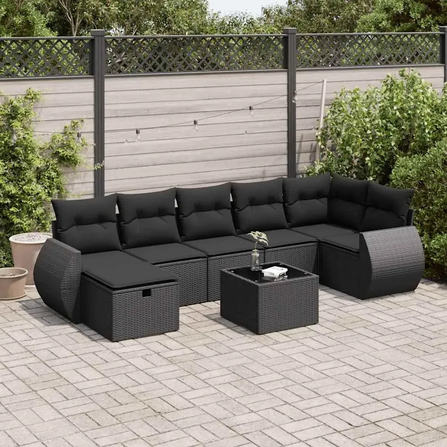 Schwarze 8-tlg. vidaXL Garten-Sofagarnitur aus Poly Rattan mit Kissen und Tisch.