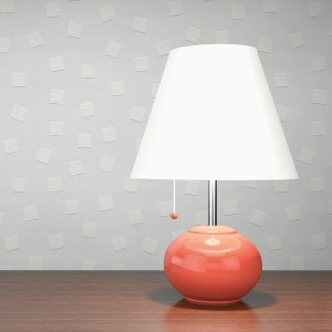 Weiße, überstreichbare Vliestapete Tadessi Meo mit 3D-Grafikmuster an der Wand.