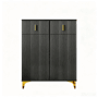 Schwarzes Sideboard Schuhschrank mit strukturierter Front, zwei Schubladen mit Goldgriffen und zwei Türen, auf Goldbeinen.