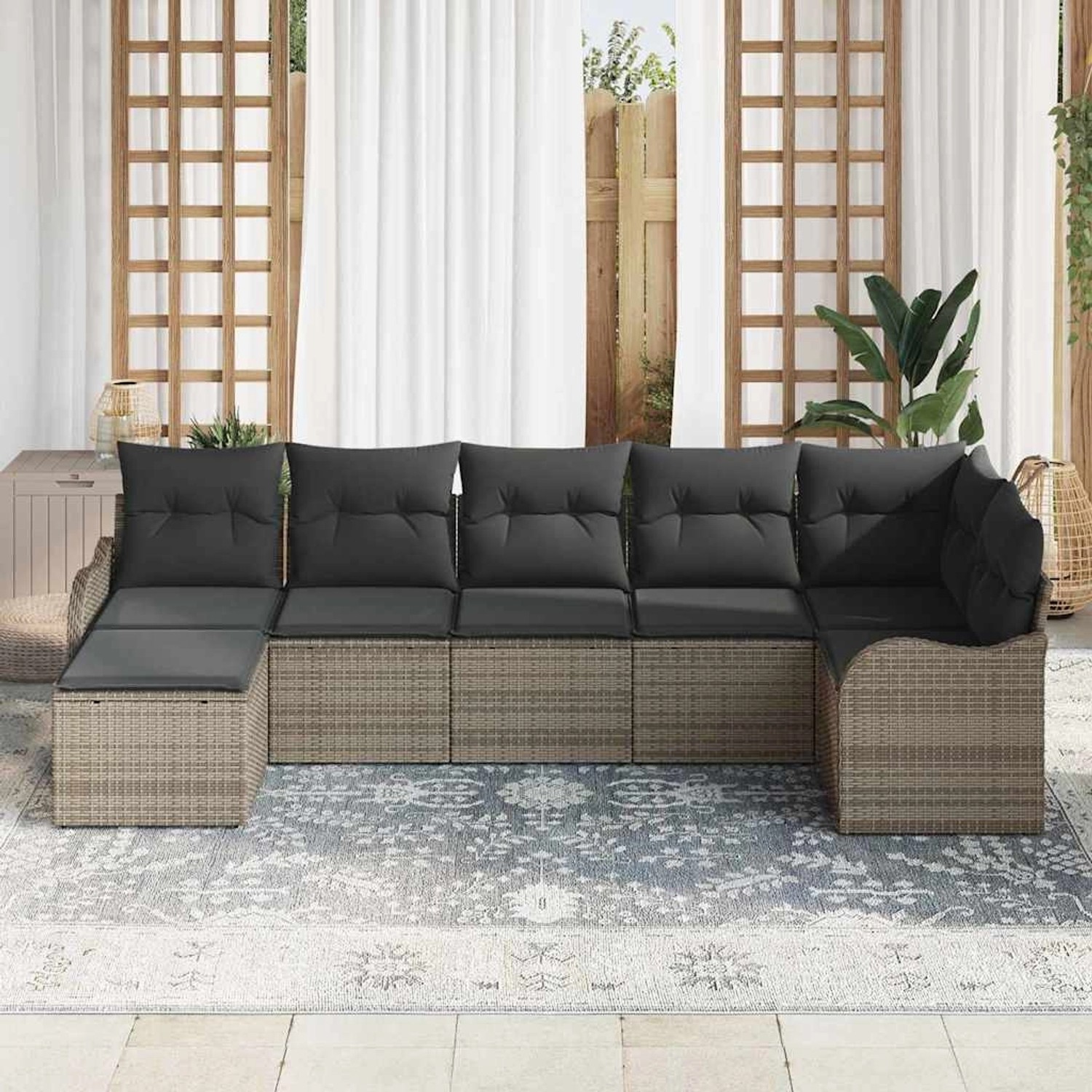Graues 7-teiliges vidaXL Garten-Sofa-Set aus Poly Rattan mit Kissen für Terrasse und Garten.