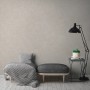 Helle, leicht strukturierte Vliestapete in Creme von OBI. Dekorative Uni-Tapete für Wohnräume.