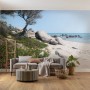 Vlies Fototapete „Mediterrane Träume“ (450x280 cm) mit Strandmotiv im Wohnraum.