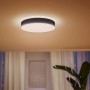 Schwarze Philips Hue Enrave L Deckenleuchte mit Dimmer, warmweißes Licht.