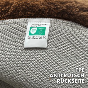 Detailaufnahme der rutschfesten Rückseite der braunen KARAT Badematte SKY, mit Oeko-Tex Zertifikat.