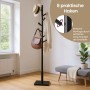 Schwarzer Songmics Kleiderständer Andi mit 8 Haken und Hut, Jacke und Tasche.