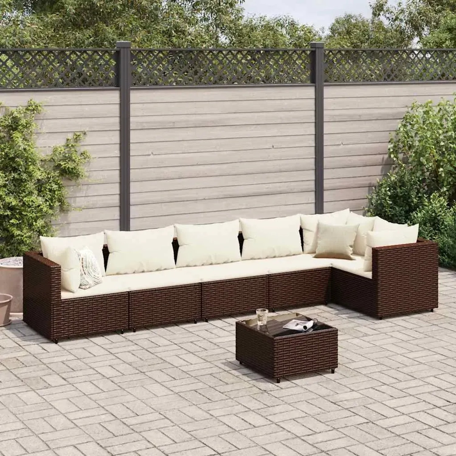 Braunes 7-tlg. vidaXL Garten-Lounge-Set aus Poly Rattan mit Kissen.