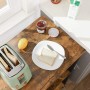 Vasagle Küchenregal mit Rollen, braun-schwarz, mit Toaster, Marmelade, Zitrone und Brot auf der Ablage.