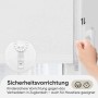 Weißes Seitenzugrollo mit Kettenzug und Kindersicherung am Fenster. Blickdicht, ohne Bohren montierbar.