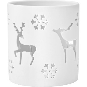 Weißes, mattes Teelichtglas aus Keramik mit ausgestanzten Rentieren und Schneeflocken.