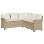 Beiges L-förmiges Couchsofa aus Poly Rattan mit Kissen für den Garten.