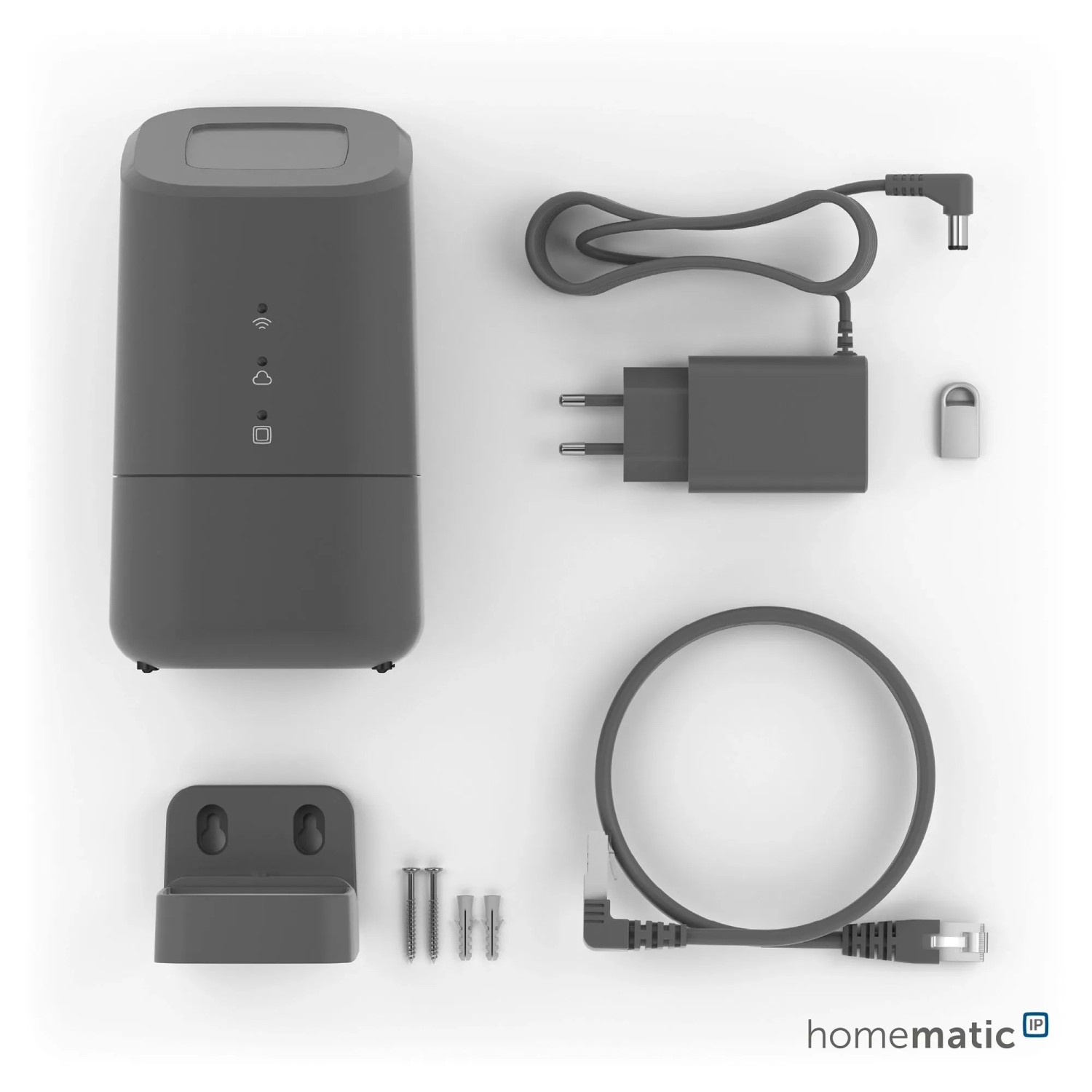 HmIP Home Control Unit in Anthrazit mit Zubehör für die Hausautomation.