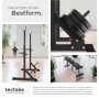 Tectake Squat Rack Apollo, multifunktional, schwarz, mit Hantelscheiben und Hantelbank im Hintergrund.