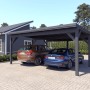 Holzbrüder Doppelcarport Ralf in Anthrazitgrau mit Blechdach und zwei geparkten Autos.