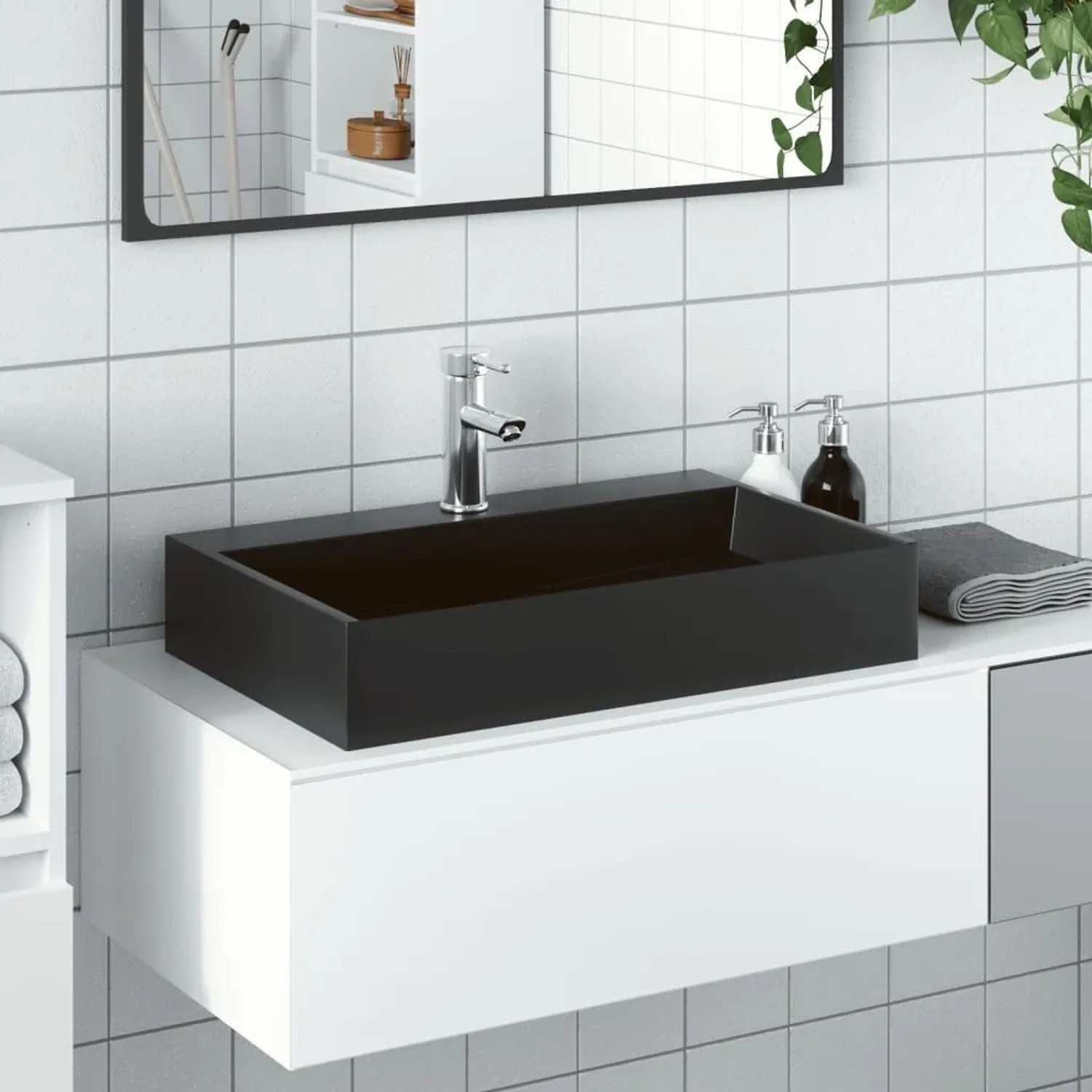 Mattschwarzes vidaXL Waschbecken (60x38 cm) aus Mineralguss auf weißem Unterschrank.