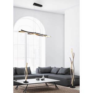 Moderne Trio LED Stehleuchte Blaze, 1-flammig, Messing matt und schwarz, im Wohnraum.