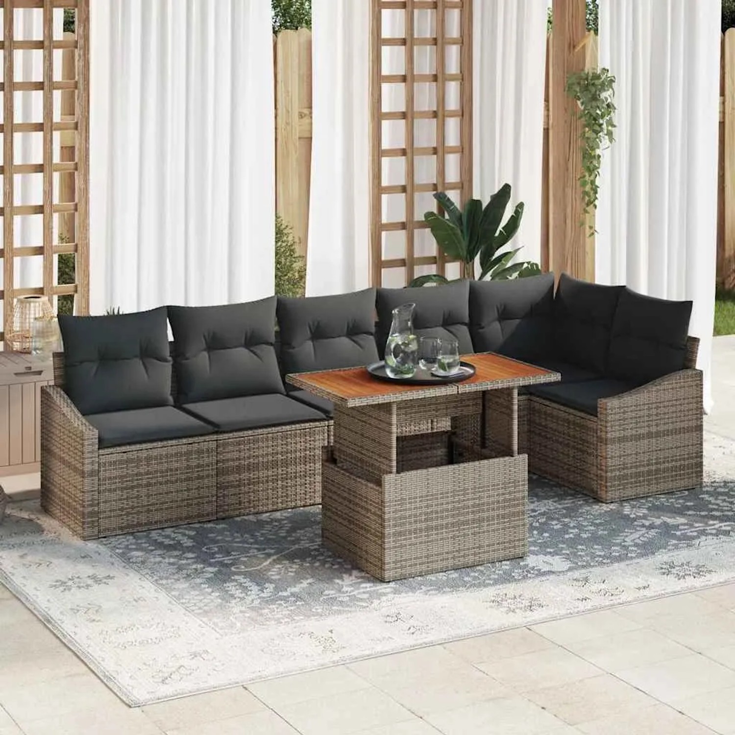 Graues 7-teiliges vidaXL Garten-Sofa-Set aus Rattan mit Tisch und Stauraum.