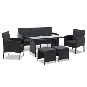 Schwarze Juskys Polyrattan Gartenmöbel Sitzgruppe Turin mit Tisch, Bank, Stühlen und Hockern.