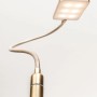 Dimmbare LED Bettleuchte in Messing-Optik mit flexiblem Schwanenhals für optimale Ausrichtung.