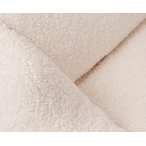 Detailaufnahme: Beiges, orthopädisches Knuffelwuff Hundebett Wollekopp aus Kunstfell.