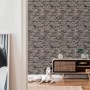 A.S. Création Vliestapete Ziegelsteinmauer in Braun und Grau im Wohnraum mit Hund.