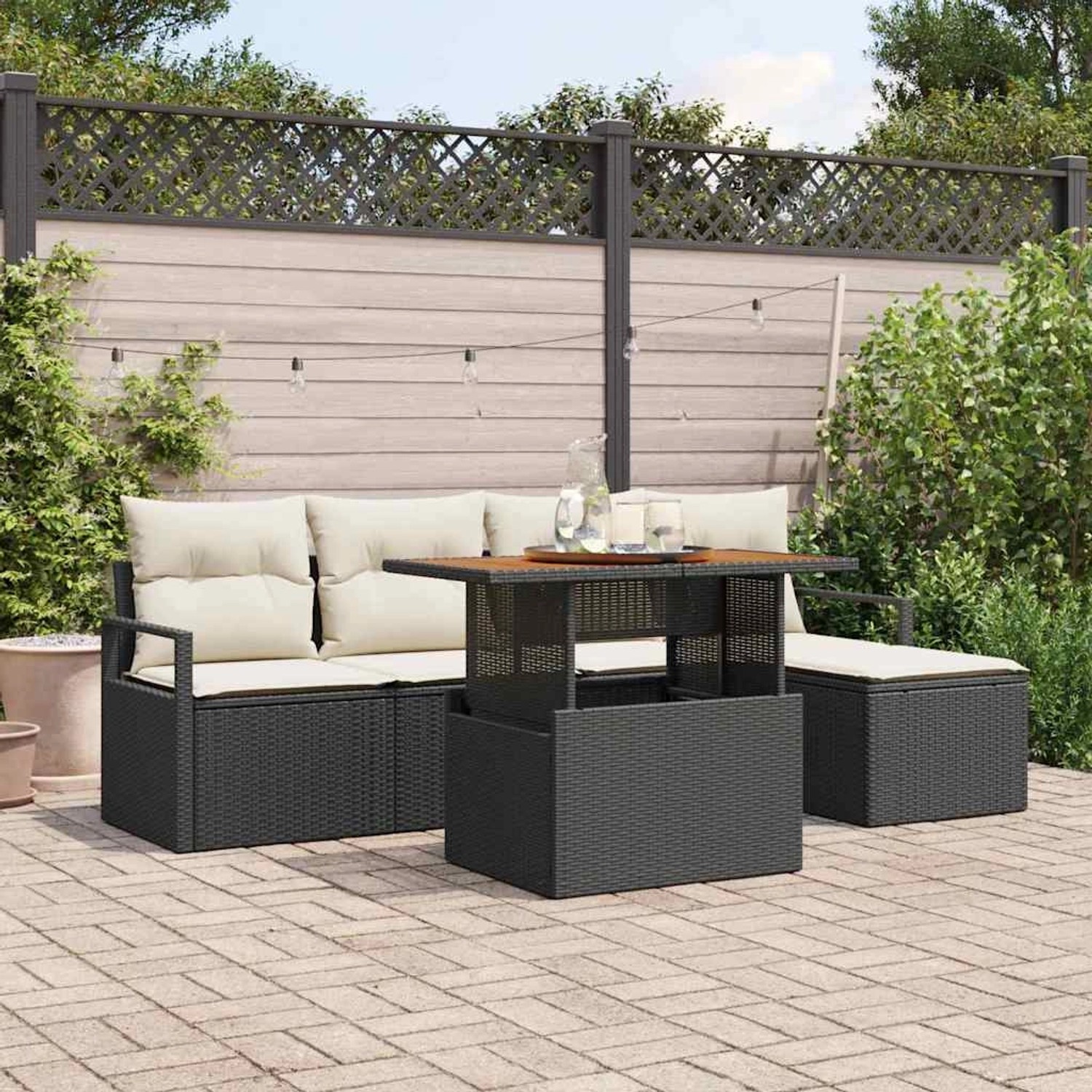 Schwarzes 6-tlg. vidaXL Garten-Sofa-Set aus Poly Rattan mit Tisch und Stauraum.