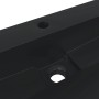 Detailaufnahme: Mattschwarzes vidaXL Waschbecken aus Mineralguss, Hahnloch sichtbar.