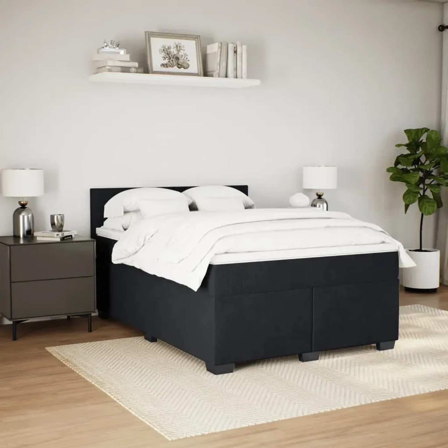 Schwarzes vidaXL Boxspringbett (140x190 cm) mit Matratze und Samtbezug im Schlafzimmer.