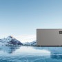 Steinbach Silent 13 Pool Wärmepumpe (13 kW) in Grau vor verschneiter Bergkulisse.