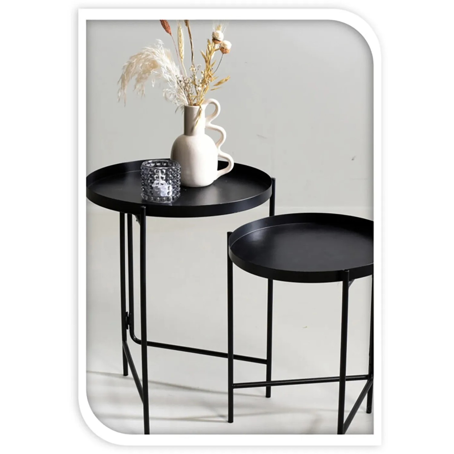 Beistelltisch 2er Set aus schwarzem Eisen, modernes Dreifuß-Design.